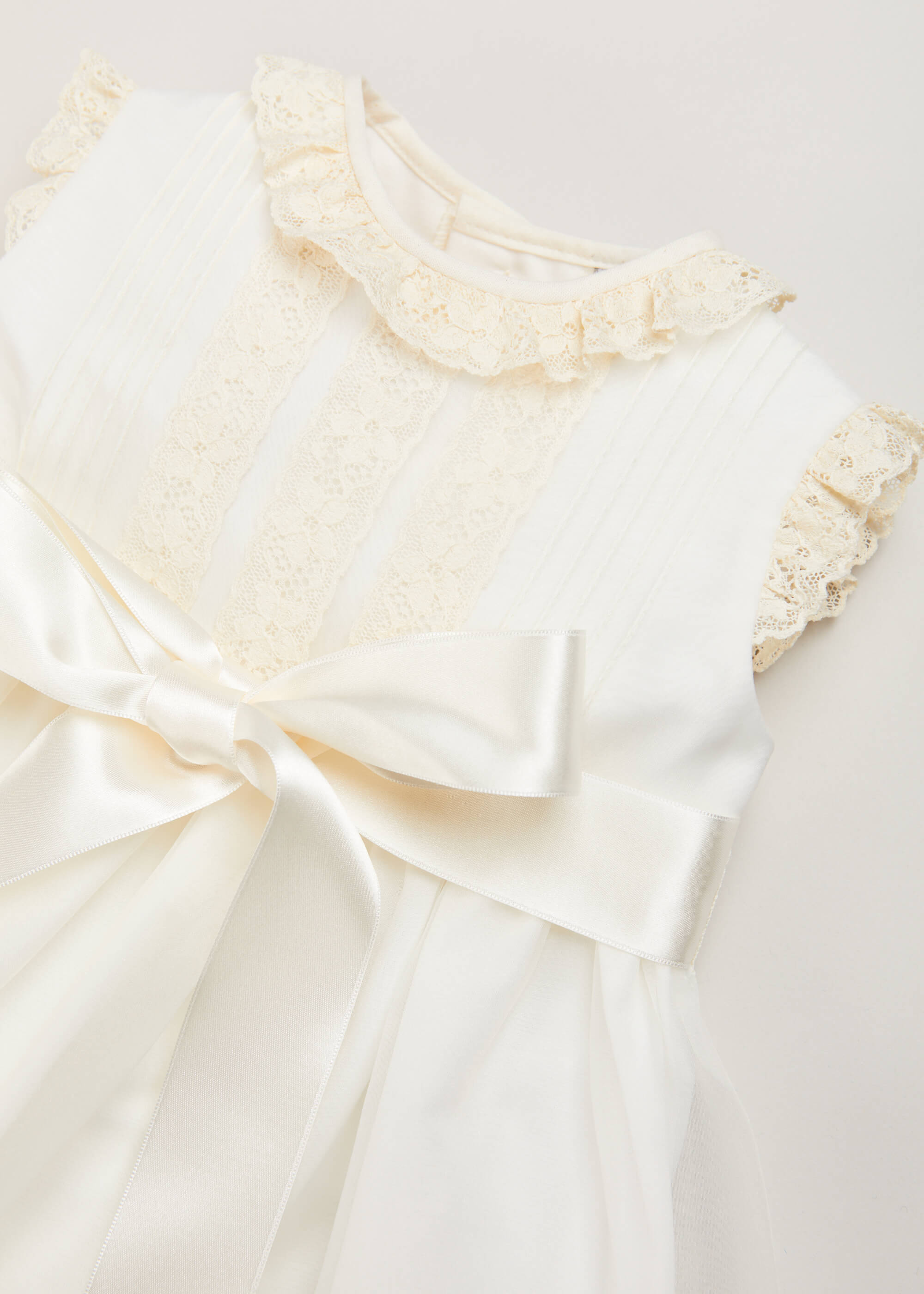 Lace Trim Fine Pleated Gown in Ivory (6-12mths) Dresses from Pepa London