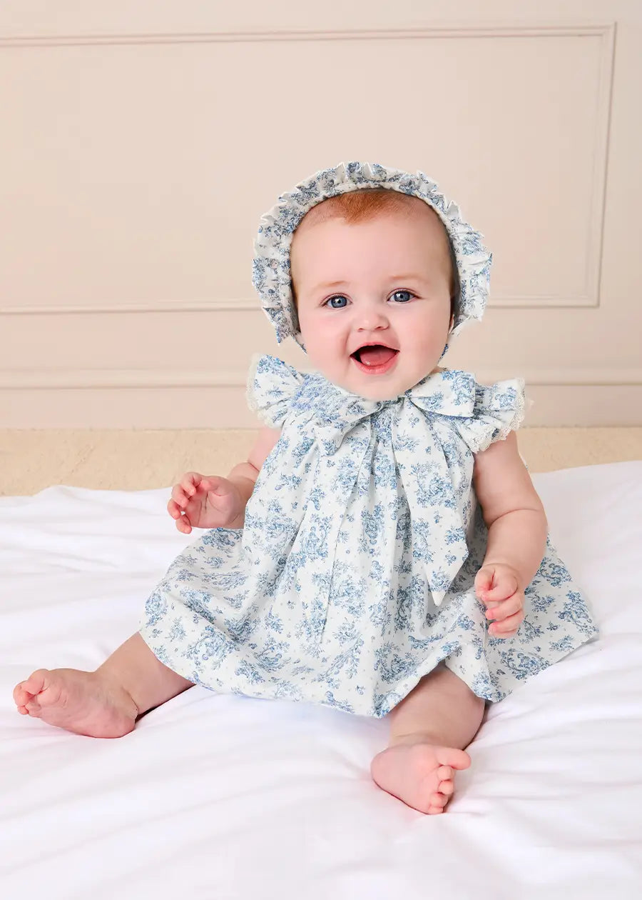 Audrey Toile Capped Sleeve Hand Smocked Dress in Blue | Pepa London Audrey Toile Capped Sleeve Hand Smocked Dress in Blue | Pepa London