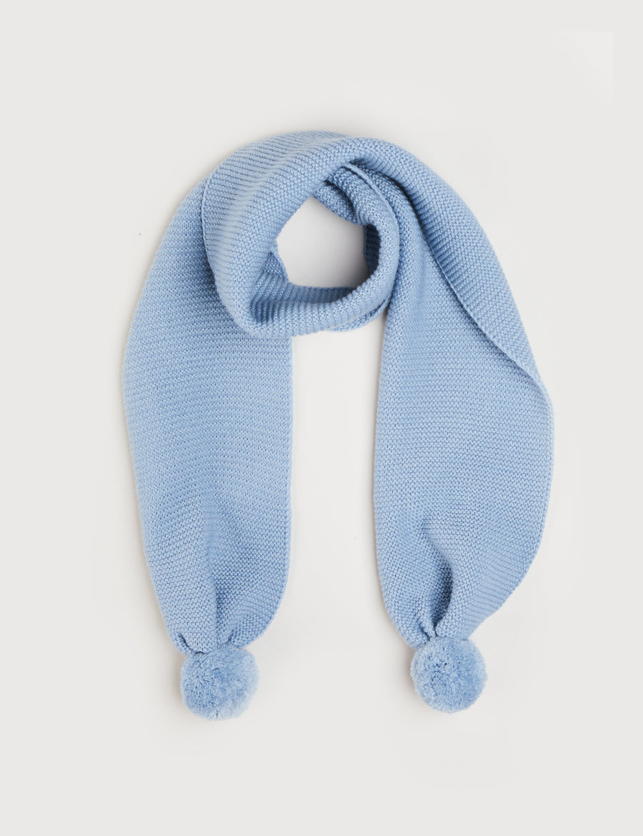 Merino Wool Pom Pom Scarf In Blue KNITTED ACCESSORIES from Pepa London