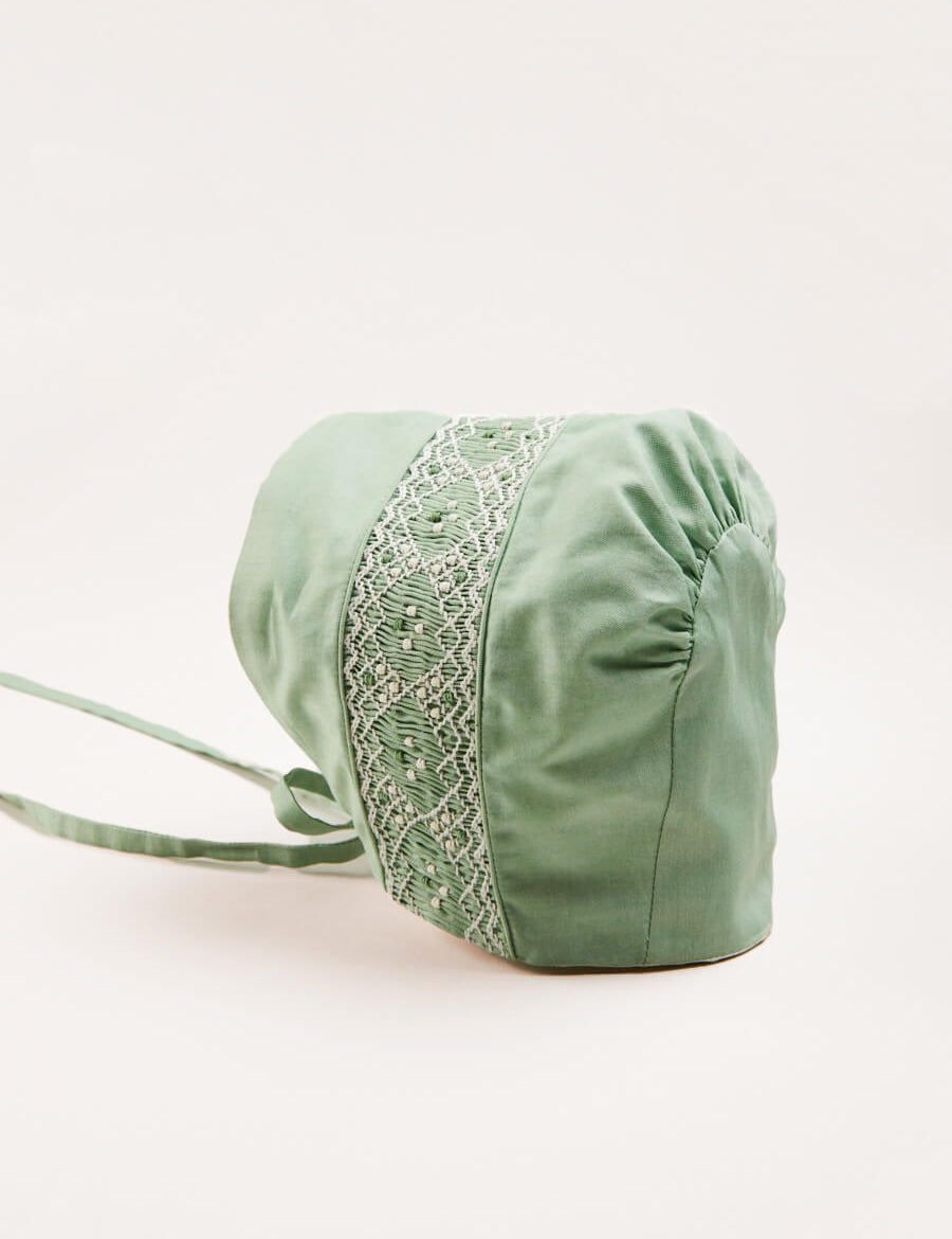 Plain Hand Smocked Bonnet in Green Knitted Accessories from Pepa London