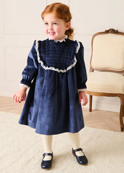 Velvet Hand Smocked Lace Detail Long Sleeve Dress in Navy (2-10yrs) Dresses from Pepa London