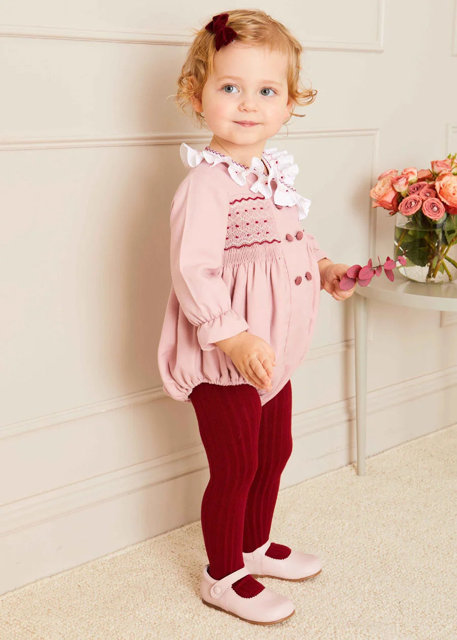 Hand Smocked Double Breasted Long Sleeve Romper in Pink | Pepa London Hand Smocked Double Breasted Long Sleeve Romper in Pink | Pepa London