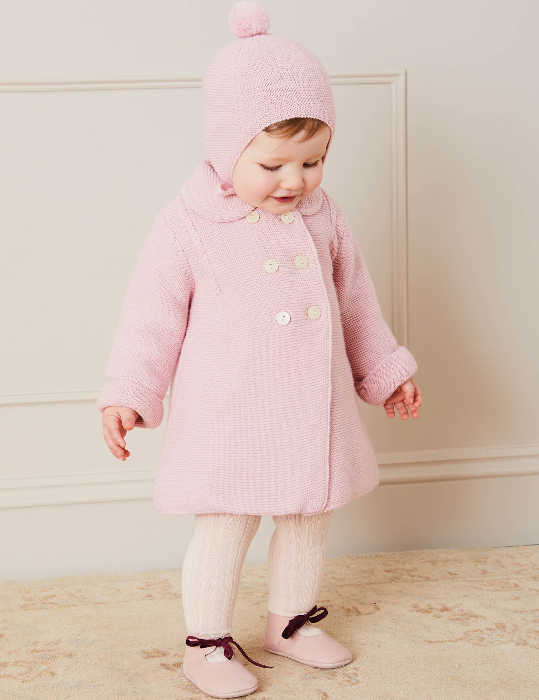 Merino Wool Pom Pom Hat In Pink (S-L) KNITTED ACCESSORIES from Pepa London