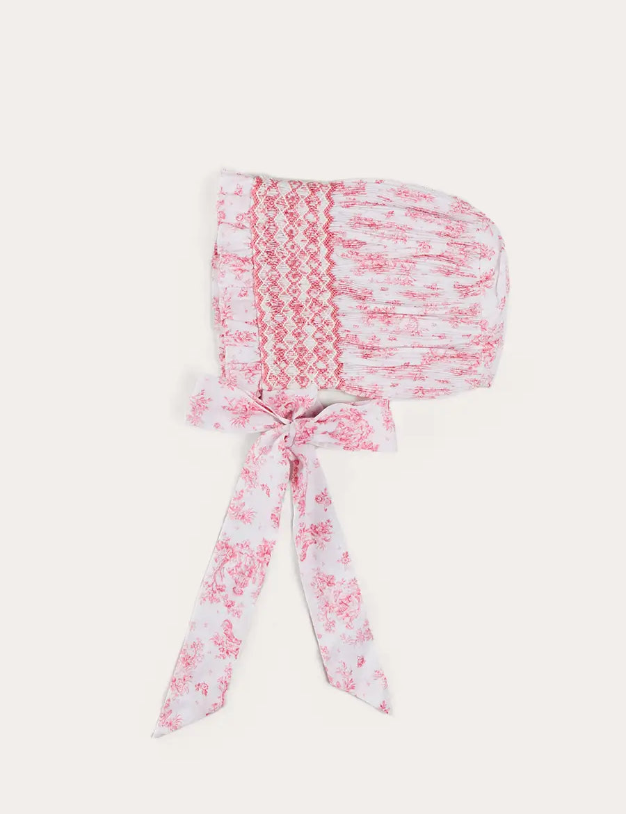 Audrey Toile Hand Smocked Bonnet in Pink (S-M) BONNETS from Pepa London