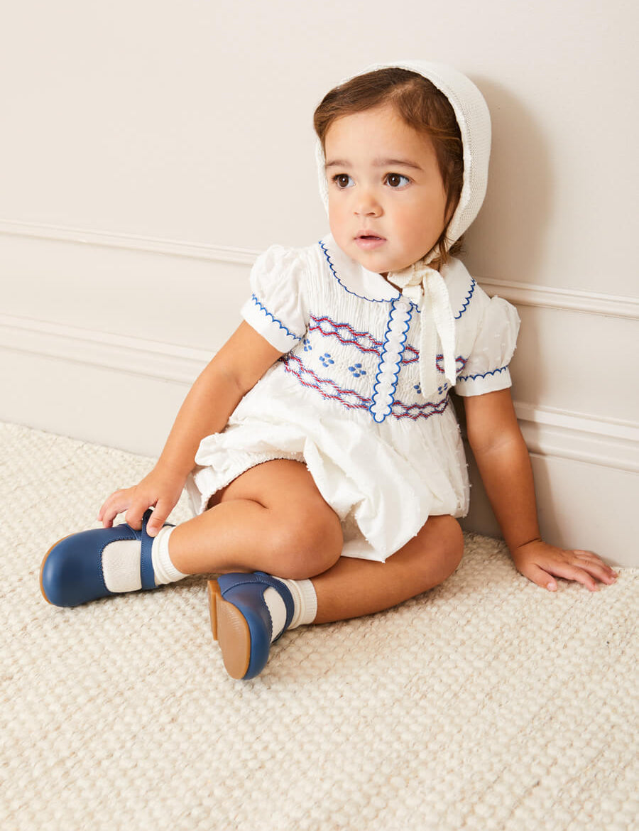 Openwork Knitted Bonnet in White (S-L) Knitted Accessories from Pepa London