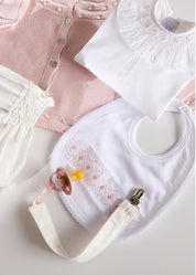 Pink Hand Smocked Bib Accessories  from Pepa London