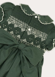 The Icon Hand Smocked Peter Pan Collar Short Sleeve Dress in Racing Green (18mths-10yrs) Dresses from Pepa London