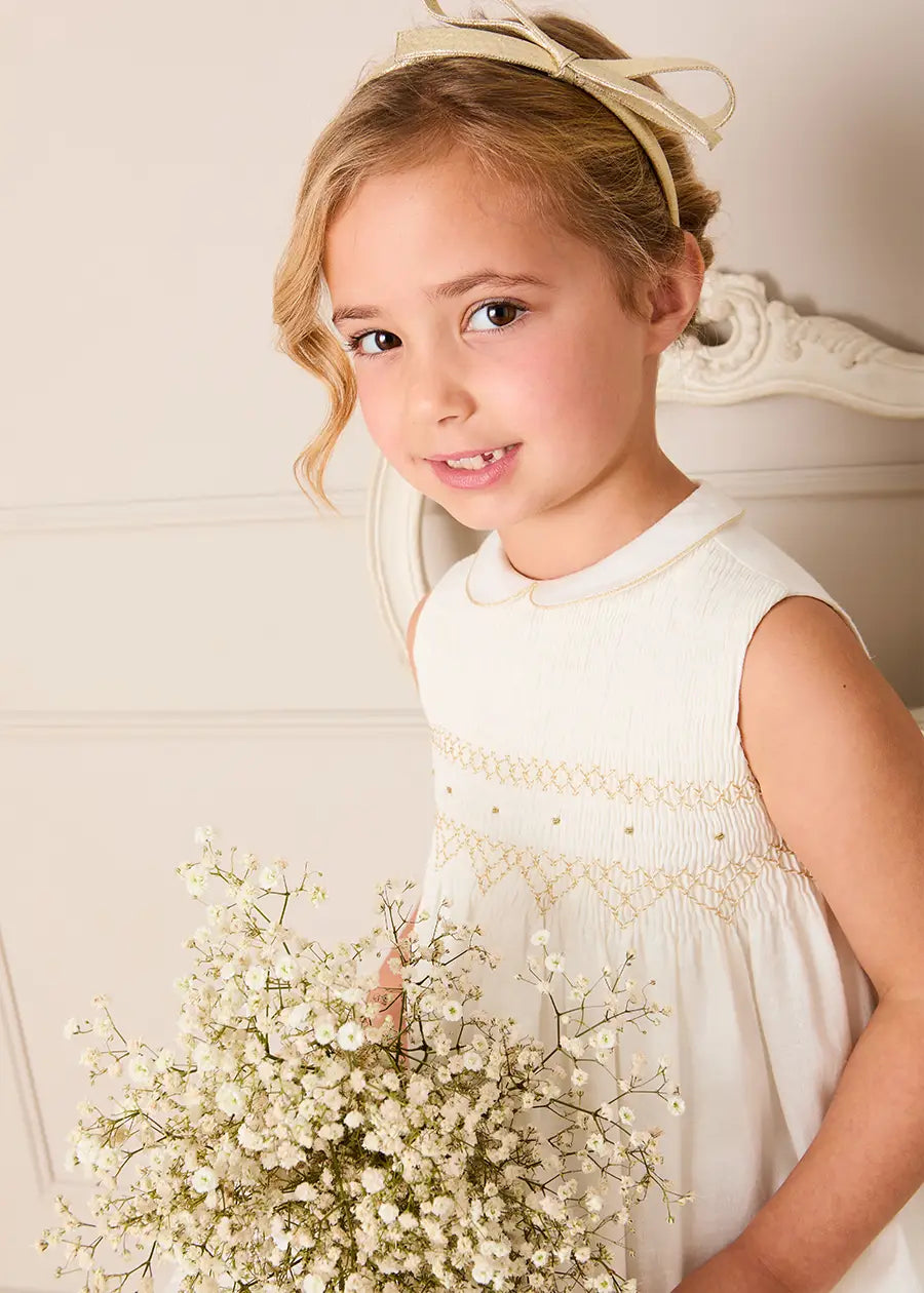 Pepa London Hand Smocked Gold Embroidered Sleeveless Dress in Ivory (12mths- 10yrs) Luxury Childrenswear Pepa London Hand Smocked Gold Embroidered Sleeveless Dress in Ivory (12mths- 10yrs) Luxury Childrenswear
