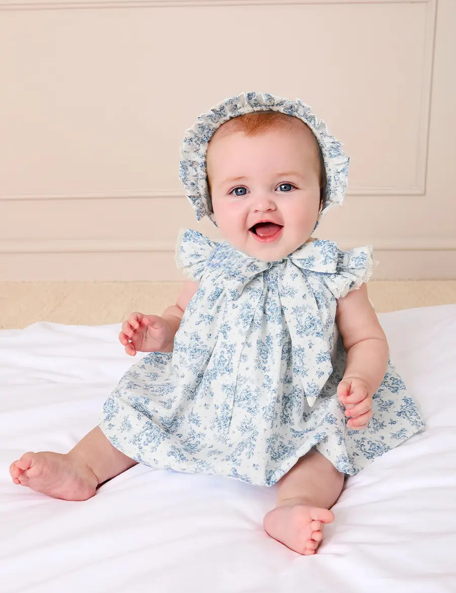 Audrey Toile Capped Sleeve Hand Smocked Dress with Bloomers in Blue (3-12mths) Dresses from Pepa London