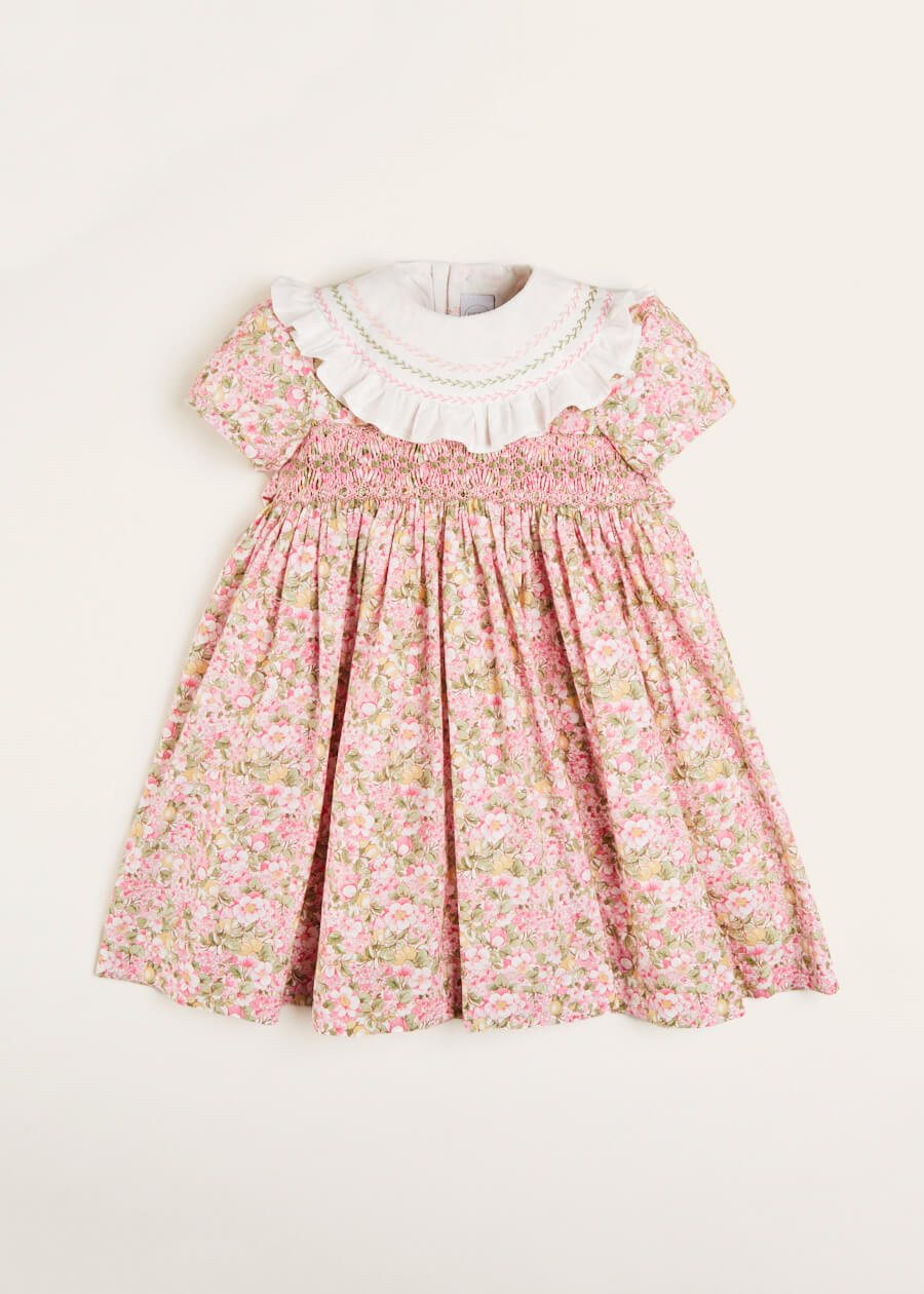 Eloise Floral Print Hand Smocked Short Sleeve Dress in Pink (12mths-10yrs) Dresses  from Pepa London