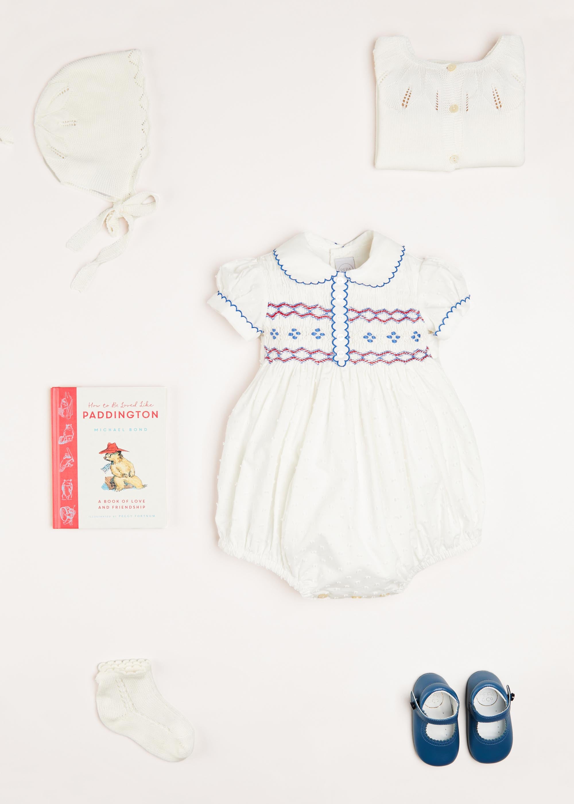 Scallop Collar Hand Smocked Short Sleeve Romper in White (6mths-2yrs) Rompers  from Pepa London