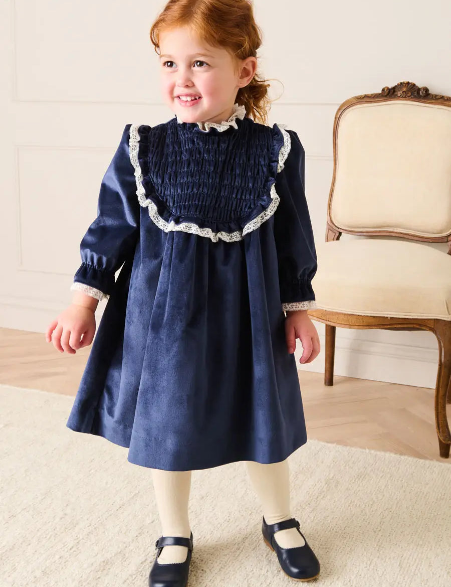Velvet Hand Smocked Lace Detail Long Sleeve Dress in Navy (2-10yrs) Dresses from Pepa London