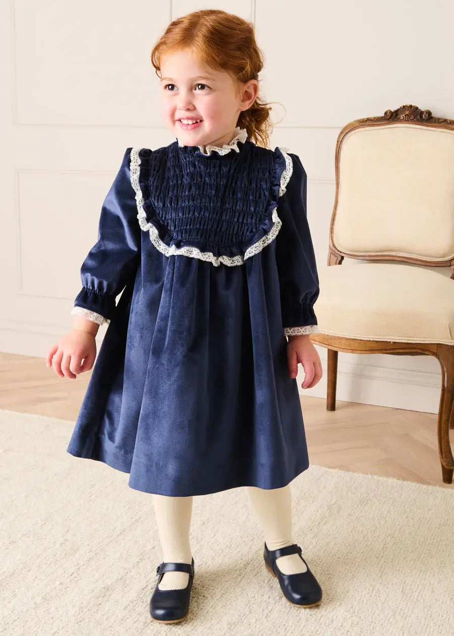 Velvet Hand Smocked Lace Detail Long Sleeve Dress in Navy (2-10yrs) Dresses from Pepa London