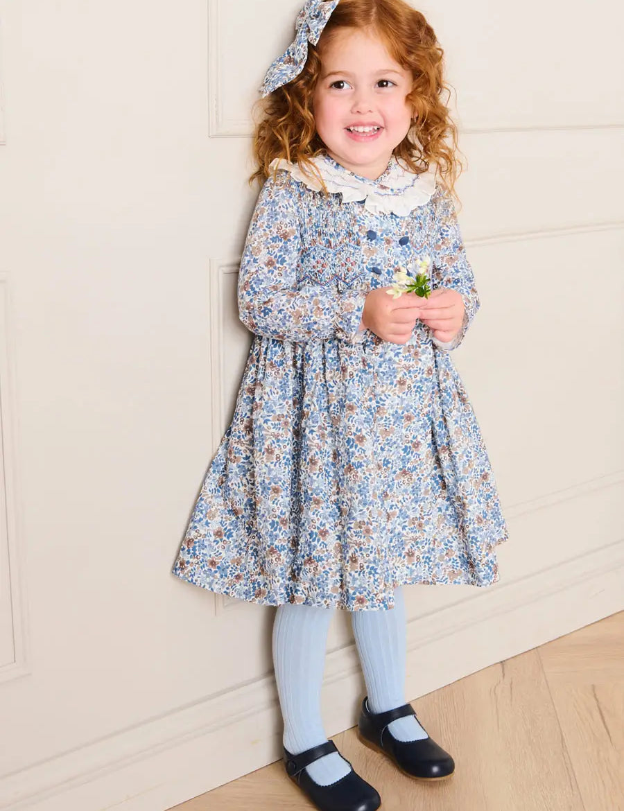 Beatrice Floral Hand Smocked Double Breasted Long Sleeve Dress in Blue (18mths-10yrs) Dresses from Pepa London
