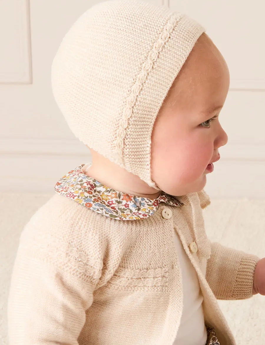 Openwork Cable Knit Bonnet in Cream (S-L) Bonnets from Pepa London