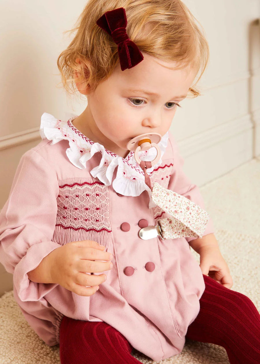 Hand Smocked Double Breasted Long Sleeve Romper in Pink | Pepa London Hand Smocked Double Breasted Long Sleeve Romper in Pink | Pepa London