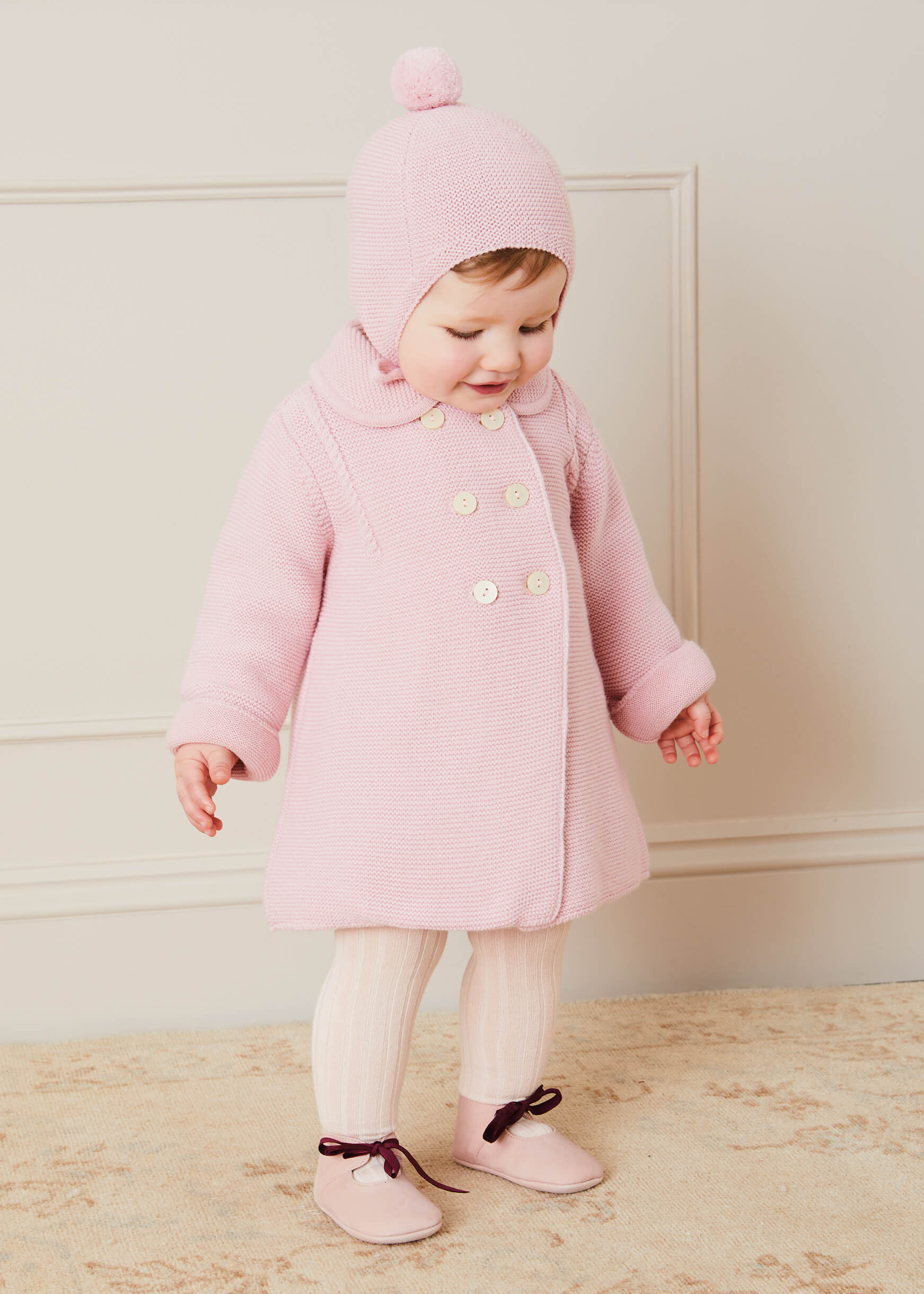 Merino Wool Pom Pom Hat In Pink (S-L) KNITTED ACCESSORIES  from Pepa London