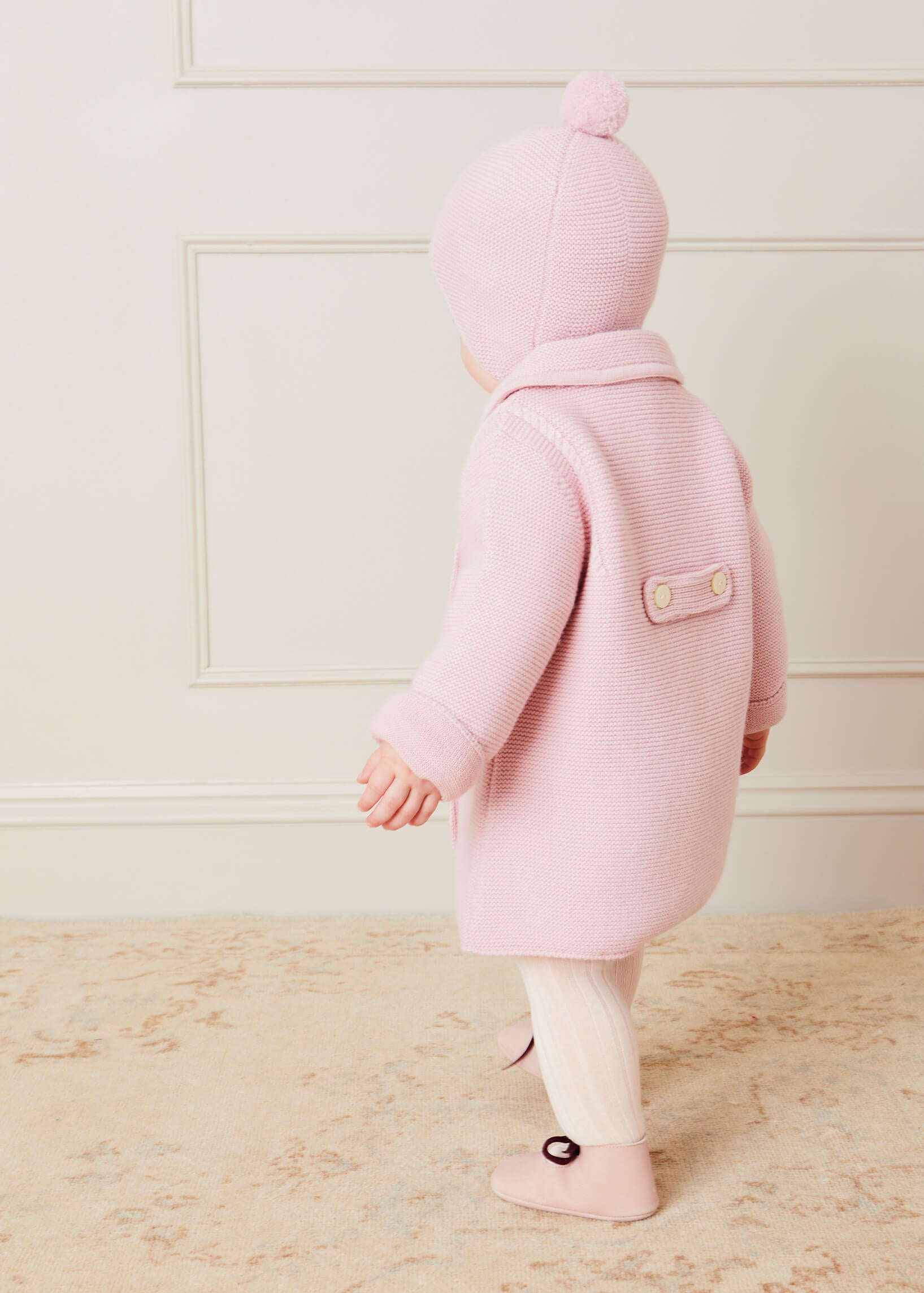 Merino Wool Pom Pom Hat In Pink (S-L) KNITTED ACCESSORIES  from Pepa London
