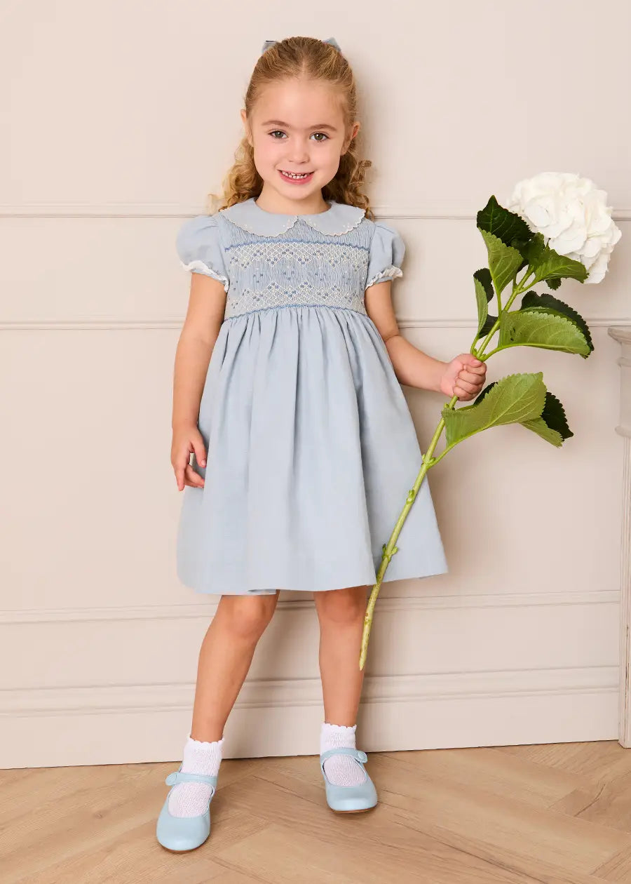 Hand Smocked Peter Pan Collar Short Sleeve Dress in Sky Blue (12mths-10yrs) Dresses from Pepa London
