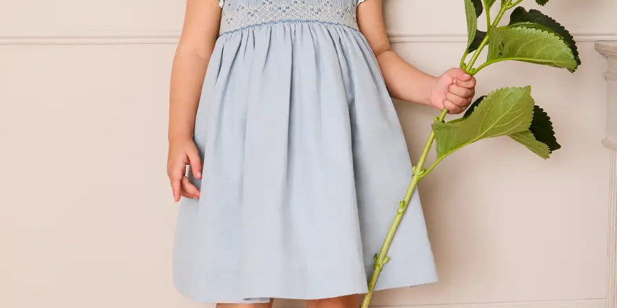 Hand Smocked Peter Pan Collar Short Sleeve Dress in Sky Blue (12mths-10yrs) Dresses from Pepa London