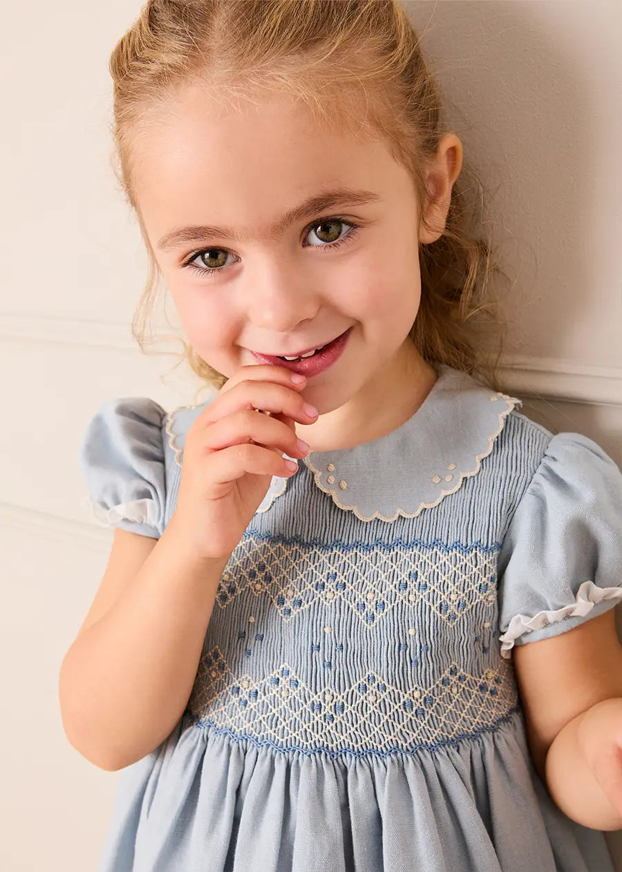 Hand Smocked Peter Pan Collar Short Sleeve Dress in Sky Blue (12mths-10yrs) Dresses from Pepa London