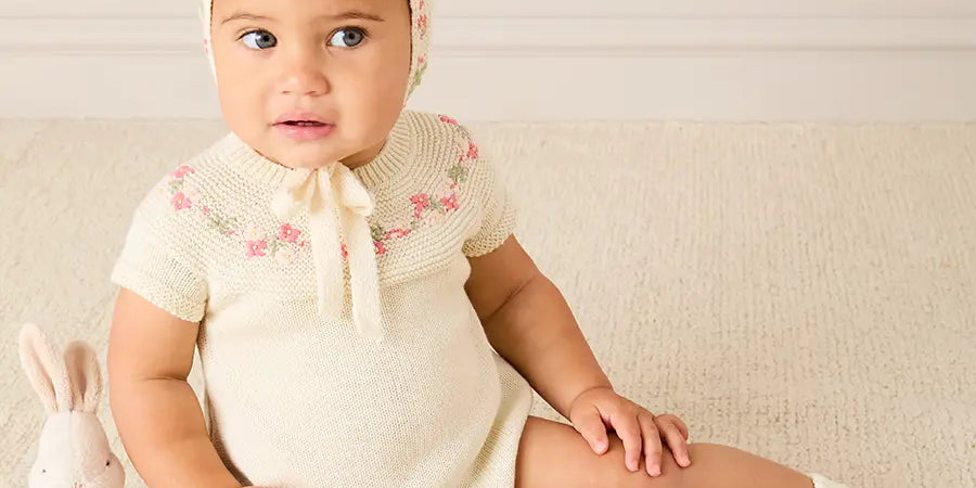 Wildflower Embroidered Knitted Romper in Cream (1-9mths) ROMPERS from Pepa London