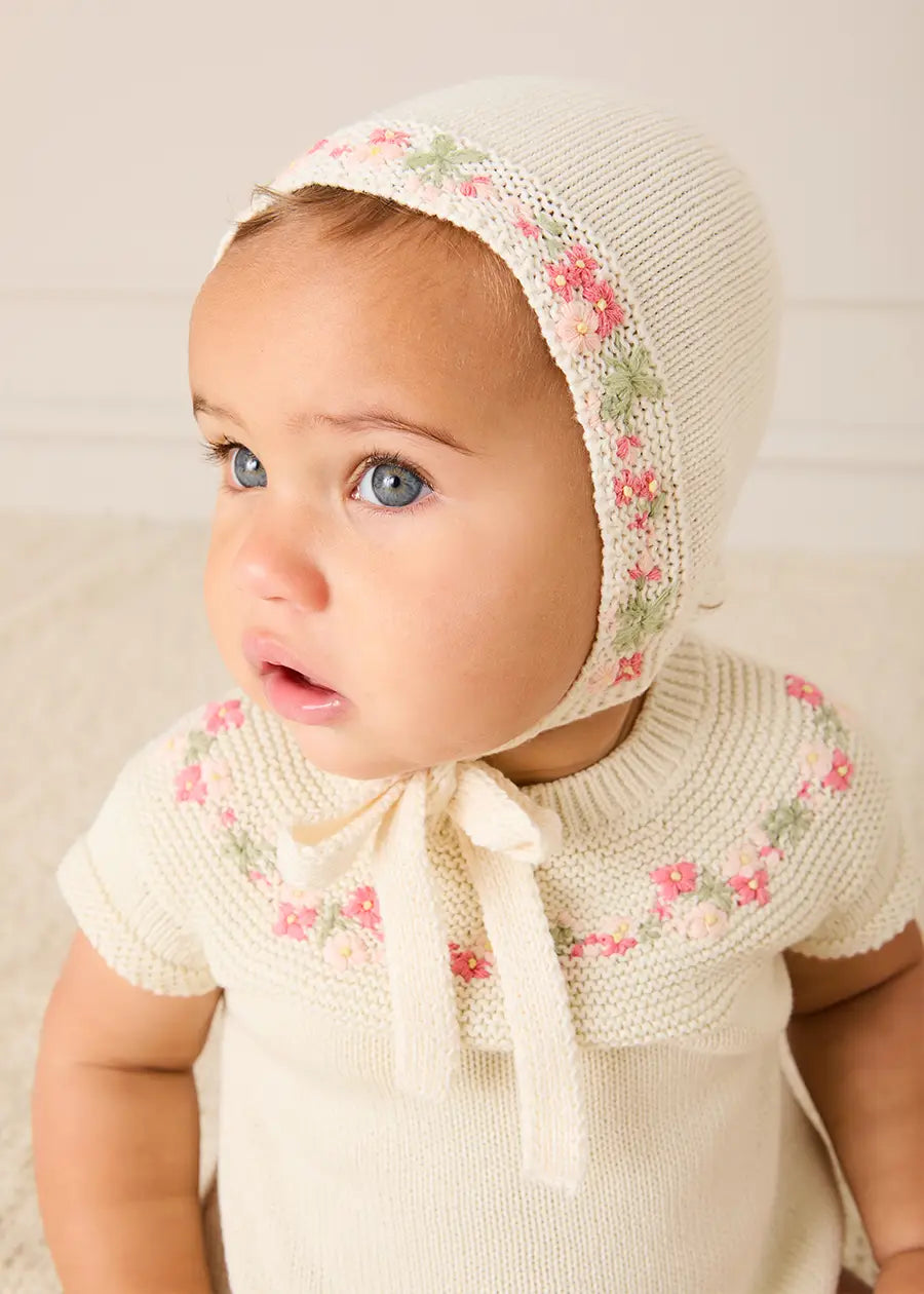 Wildflower Embroidered Knitted Romper in Cream (1-9mths) Rompers from Pepa London