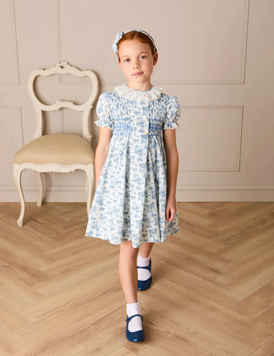Audrey Toile Hand Smocked Ruffle Collar Short Sleeve Dress in Blue (12mths- 10yrs) DRESSES from Pepa London