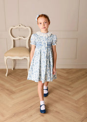 Audrey Toile Hand Smocked Ruffle Collar Short Sleeve Dress in Blue (12mths- 10yrs) DRESSES from Pepa London