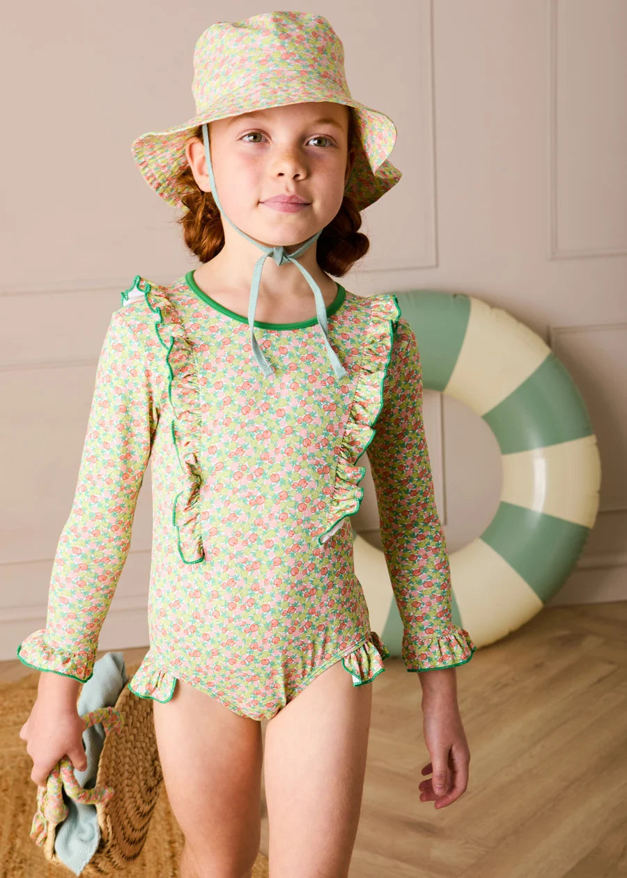 Annie Apple Print Ruffle Detail Long Sleeve Swimsuit in Green (12mths- 10yrs) Swimwear from Pepa London