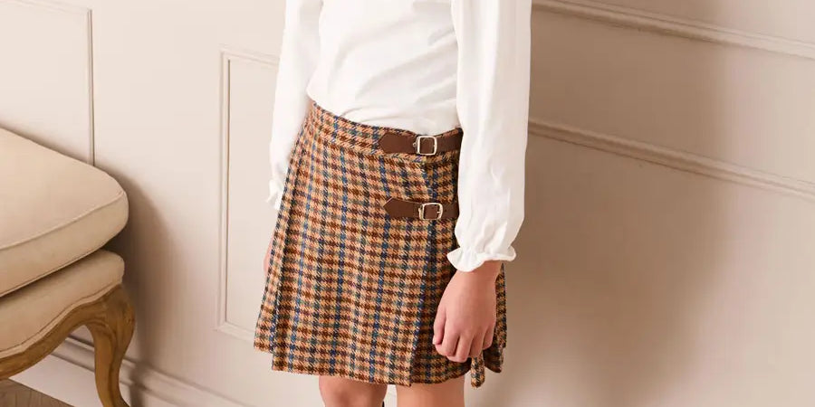 Vincent Check Buckle Detail Pleated Skirt in Brown (2-12yrs) Skirts from Pepa London