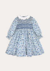 Daphne Floral Hand Smocked Frill Collar Long Sleeve Dress in Blue (18mths-10yrs) Dresses from Pepa London