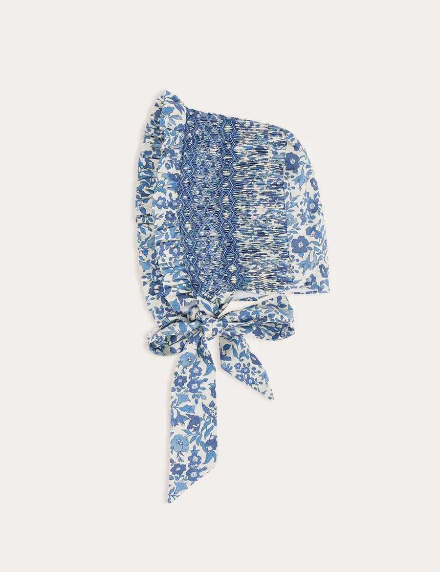 Daphne Floral Hand Smocked Bonnet in Blue (S-L) Knitted Accessories from Pepa London
