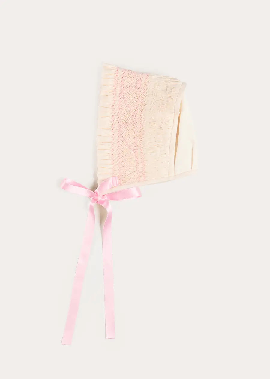 Off White and Pink Hand Smocked Baby Bonnet BONNETS from Pepa London