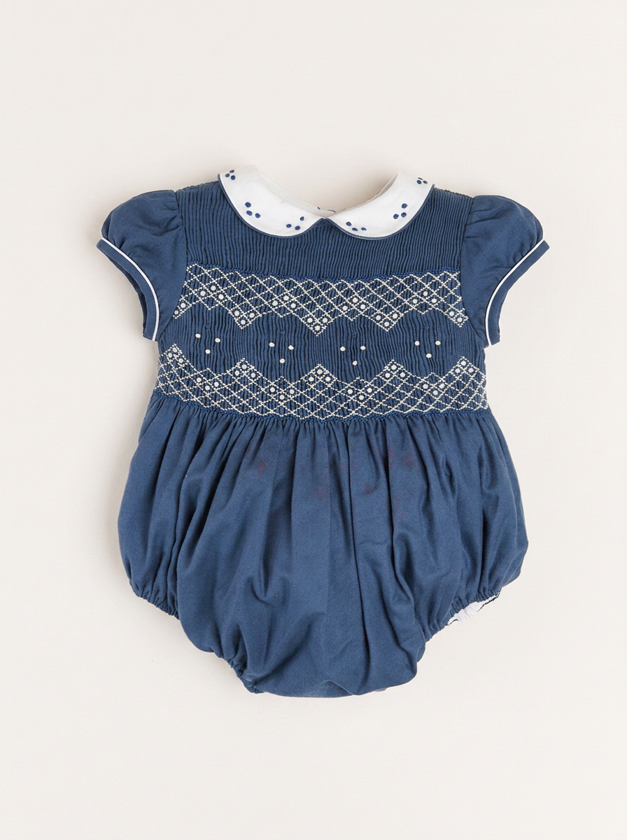 G6RO0858BLU-Handsmocked_Peter_Pan_collar_Romper_in_Blue_-FRONT_edited.png