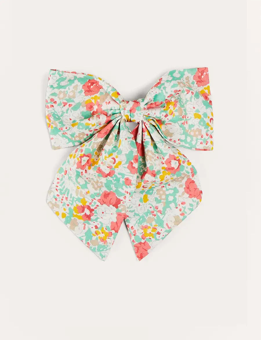 Clementine Floral Long Bow Hair Clip in Coral HAIR ACCESSORIES from Pepa London