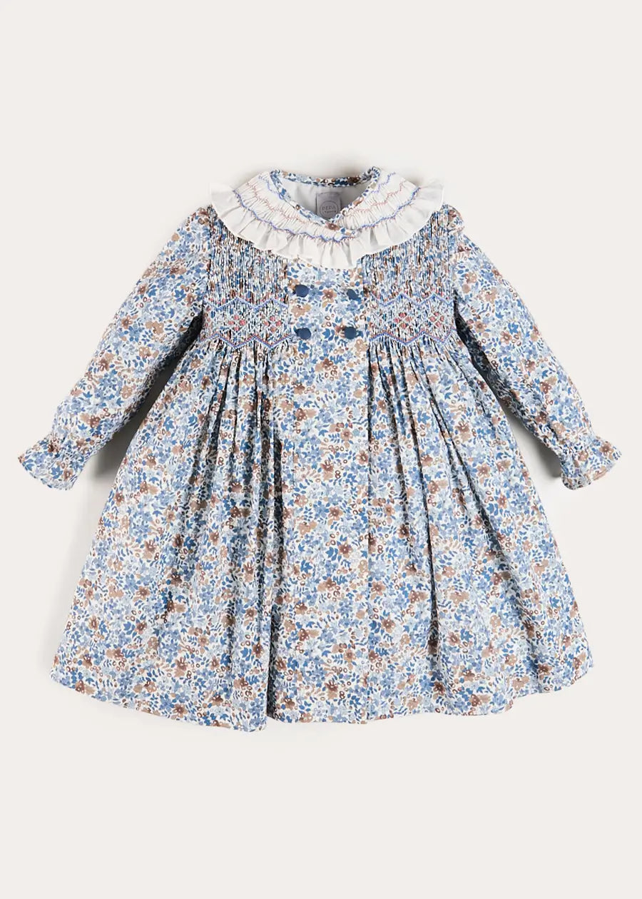 Beatrice Floral Hand Smocked Double Breasted Long Sleeve Dress in Blue (18mths-10yrs) Dresses from Pepa London