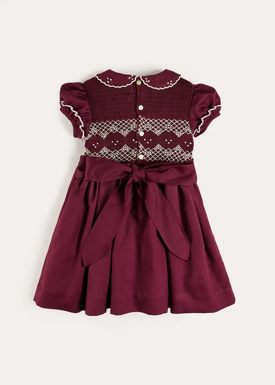 Hand Smocked Peter Pan Collar Short Sleeve Dress in Burgundy (12mths-10yrs) Dresses from Pepa London