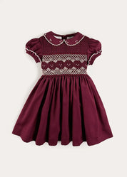 Hand Smocked Peter Pan Collar Short Sleeve Dress in Burgundy (12mths-10yrs) Dresses from Pepa London