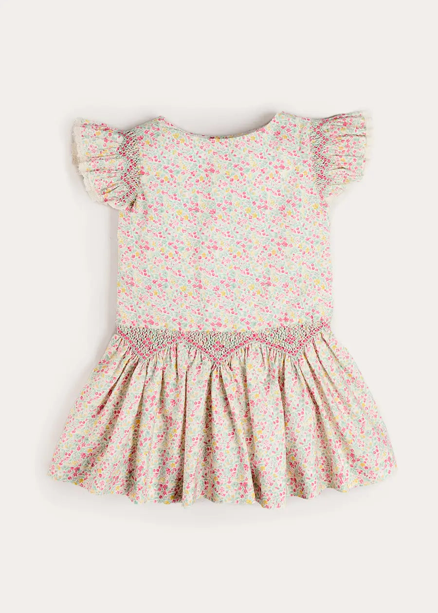 Pepa London Adelaide Floral Smocked Cap Sleeve Drop Waist Dress in Pink (4-12yrs) Luxury Childrenswear Pepa London Adelaide Floral Smocked Cap Sleeve Drop Waist Dress in Pink (4-12yrs) Luxury Childrenswear