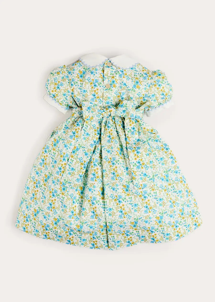 Louisa Floral Hand Smocked Short Sleeve Dress in Blue (18mths- 10yrs) Dresses from Pepa London