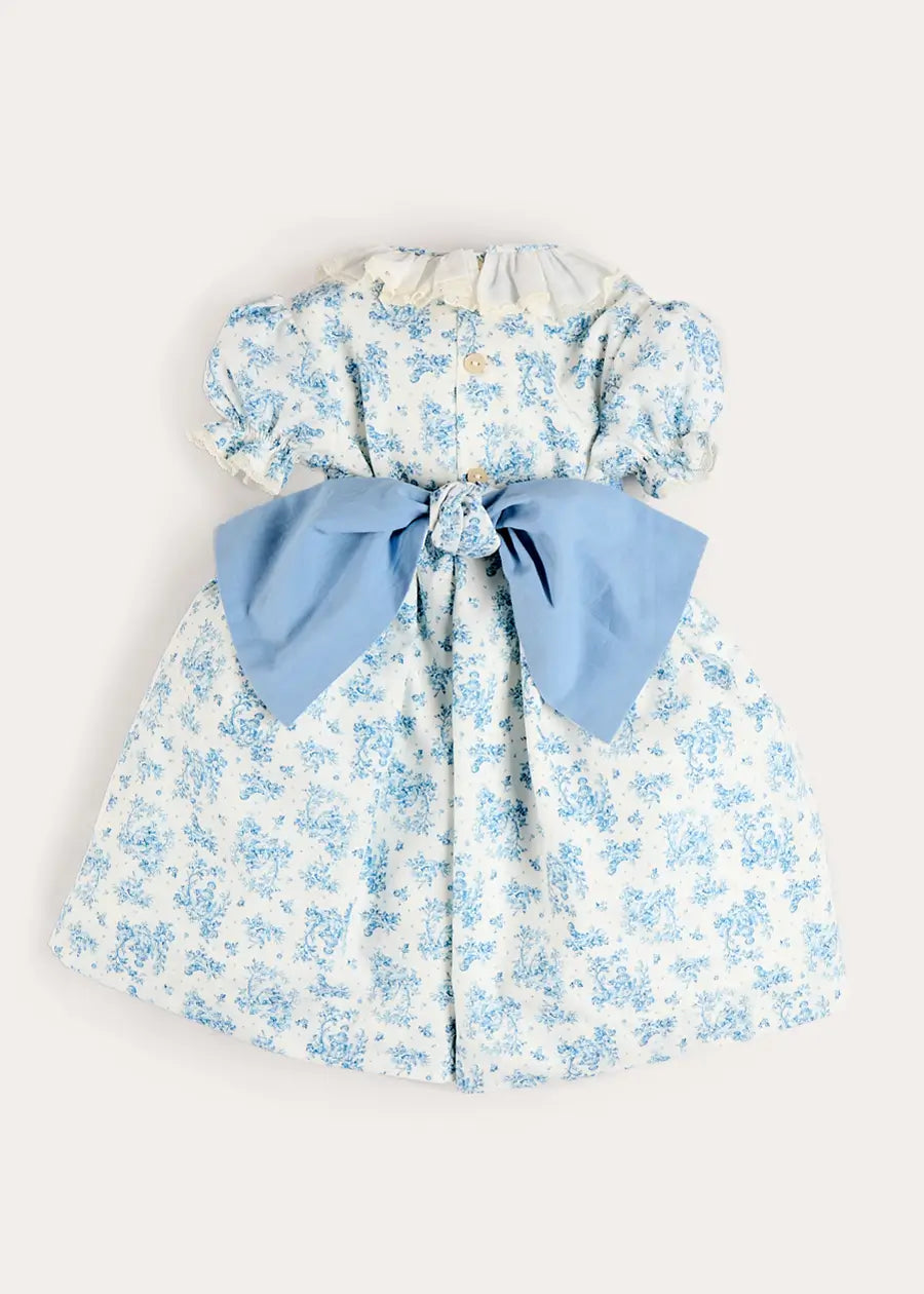 Audrey Toile Hand Smocked Ruffle Collar Short Sleeve Dress in Blue (12mths- 10yrs) Dresses from Pepa London