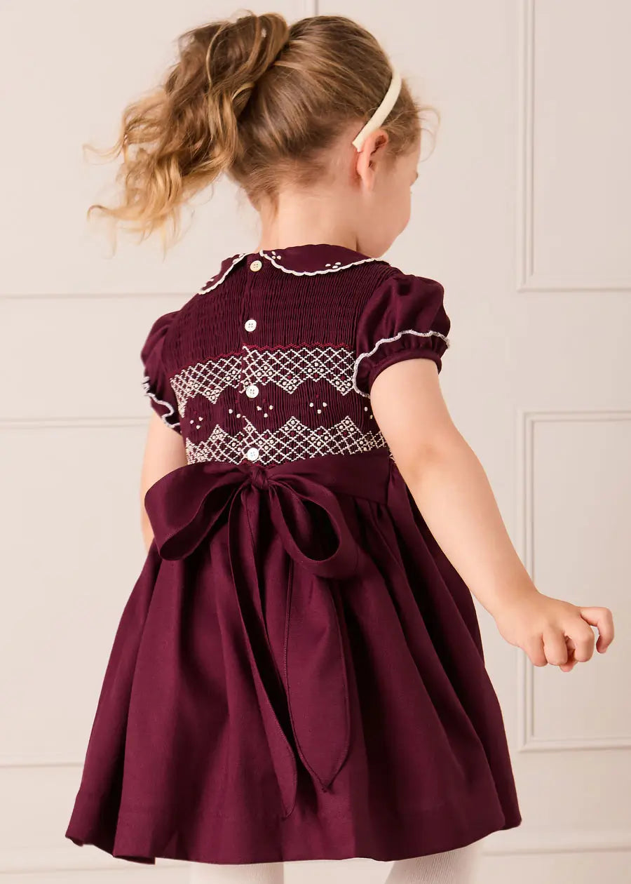 Hand Smocked Peter Pan Collar Short Sleeve Dress in Burgundy (12mths-10yrs) Dresses from Pepa London