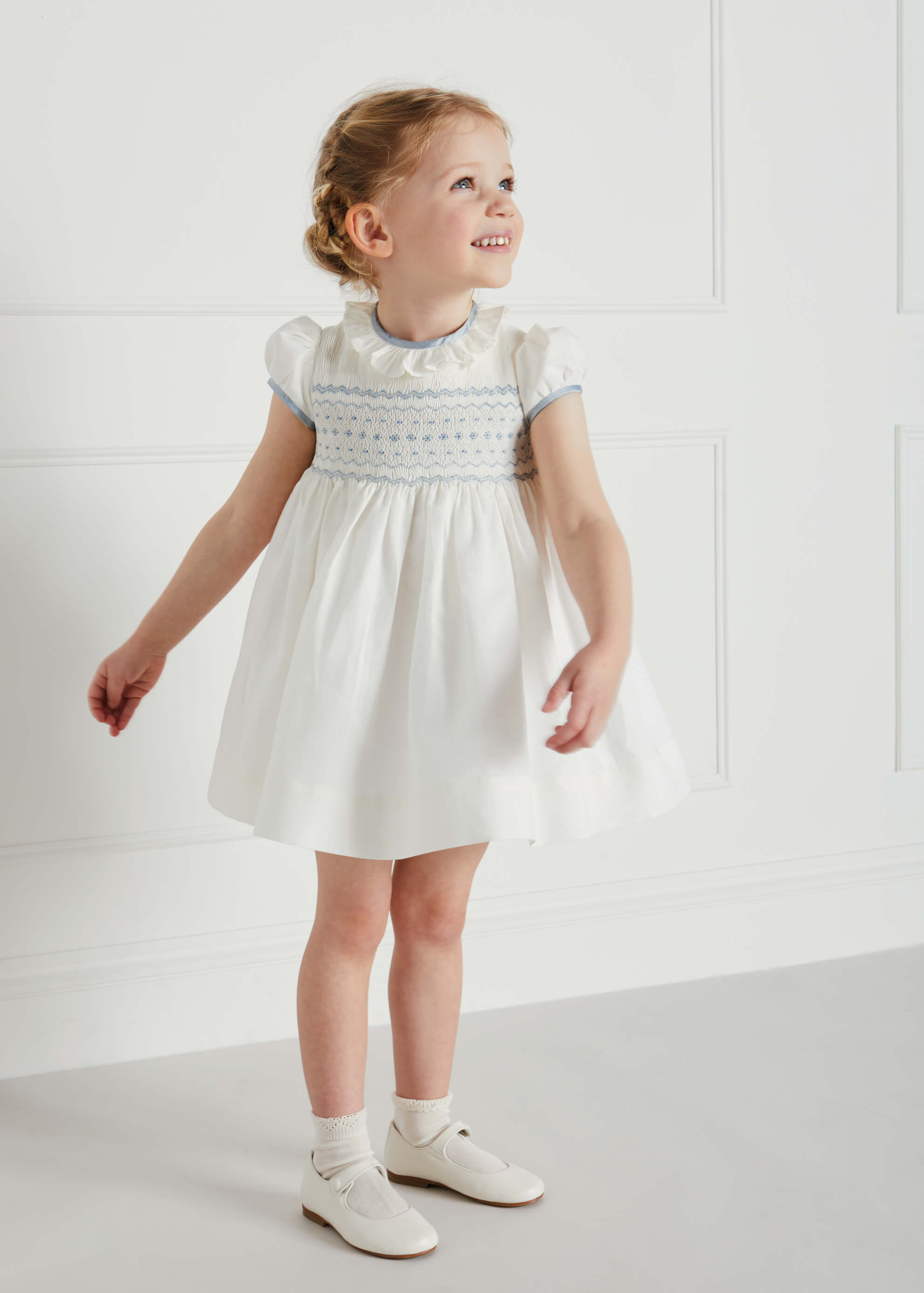Ivory Hand Smocked Occasion Dress with Blue Details (6mths-8yrs) Dresses from Pepa London