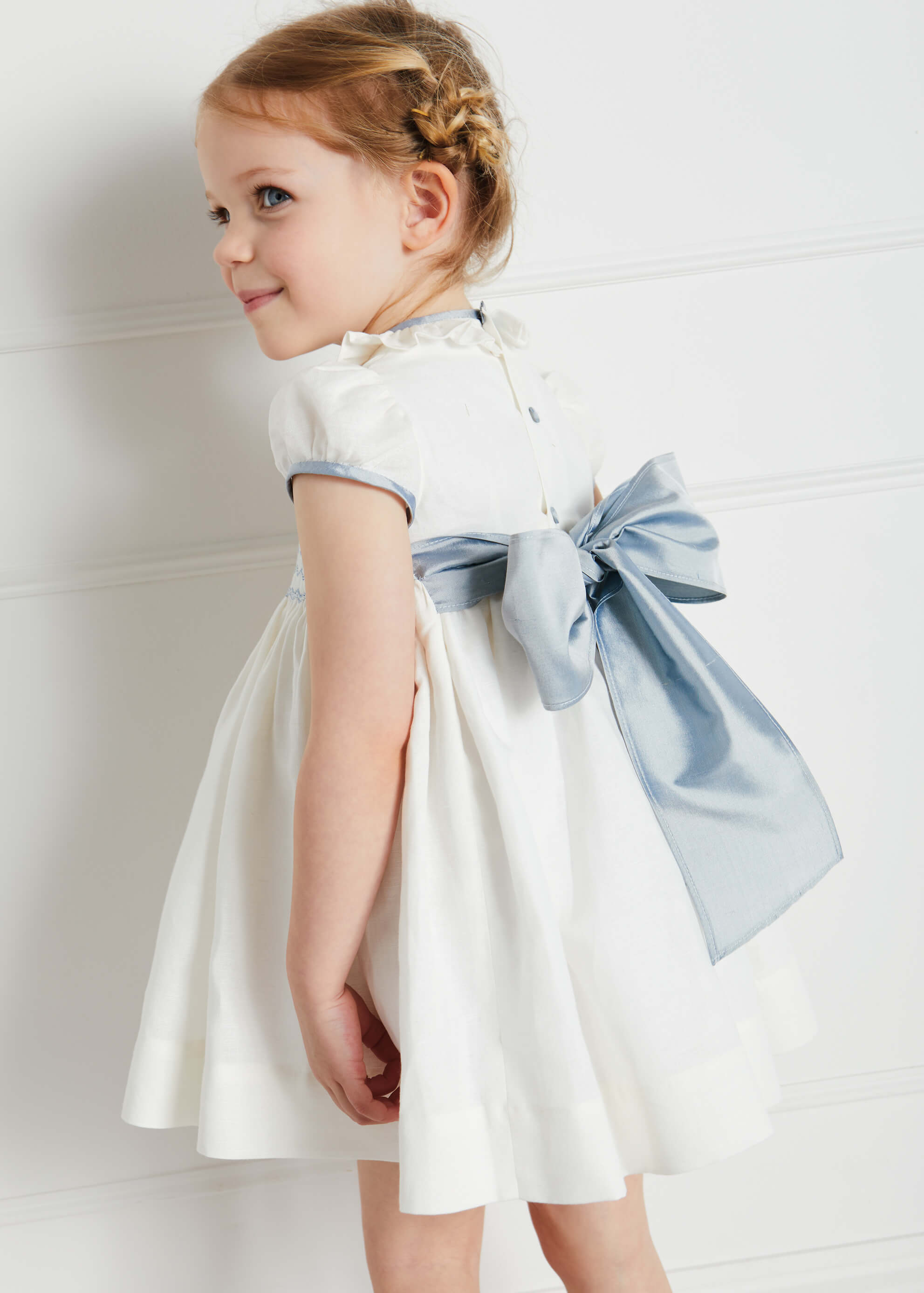 Ivory Hand Smocked Occasion Dress with Blue Details (6mths-8yrs) Dresses from Pepa London