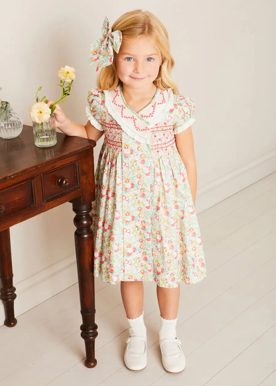 Clementine Floral Hand Smocked Double Breasted Short Sleeve Dress in Coral (12mths-10yrs) DRESSES from Pepa London