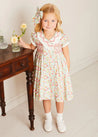 Clementine Floral Hand Smocked Double Breasted Short Sleeve Dress in Coral (12mths-10yrs) DRESSES from Pepa London