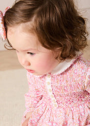 Nellie Floral Hand Smocked Long Sleeve Romper in Pink (6mths-2yrs) Rompers from Pepa London
