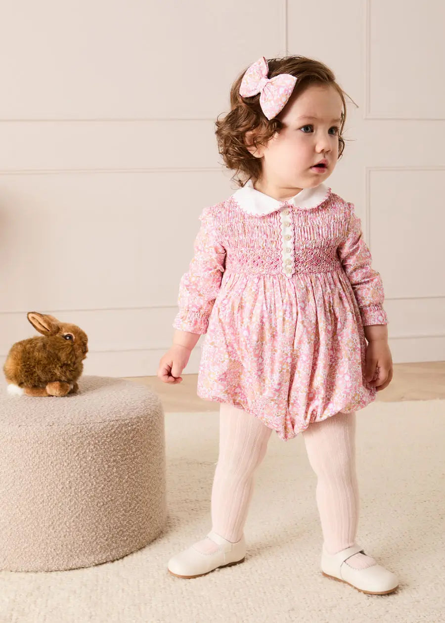 Nellie Floral Hand Smocked Long Sleeve Romper in Pink (6mths-2yrs) Rompers from Pepa London