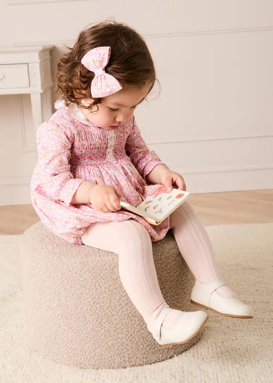 Nellie Floral Hand Smocked Long Sleeve Romper in Pink (6mths-2yrs) Rompers from Pepa London